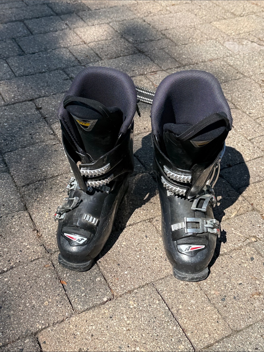 Nordica Black Alpine Ski Boots with Silver Buckles